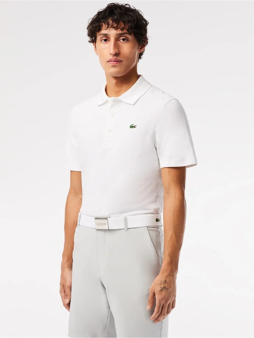 Lacoste white belt with green crocodile logo